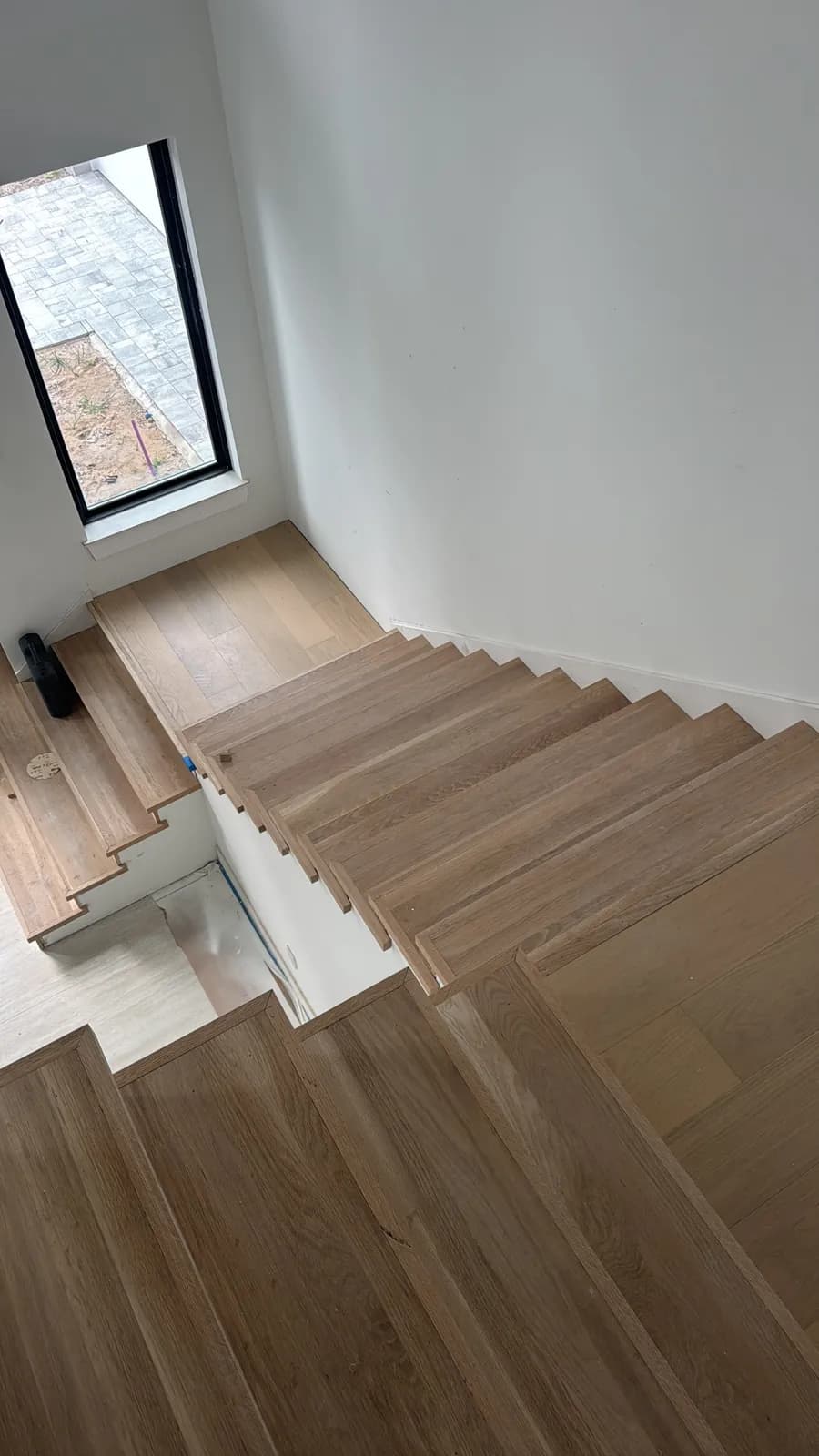 Hardwood floor refinishing project by Summit Home Services