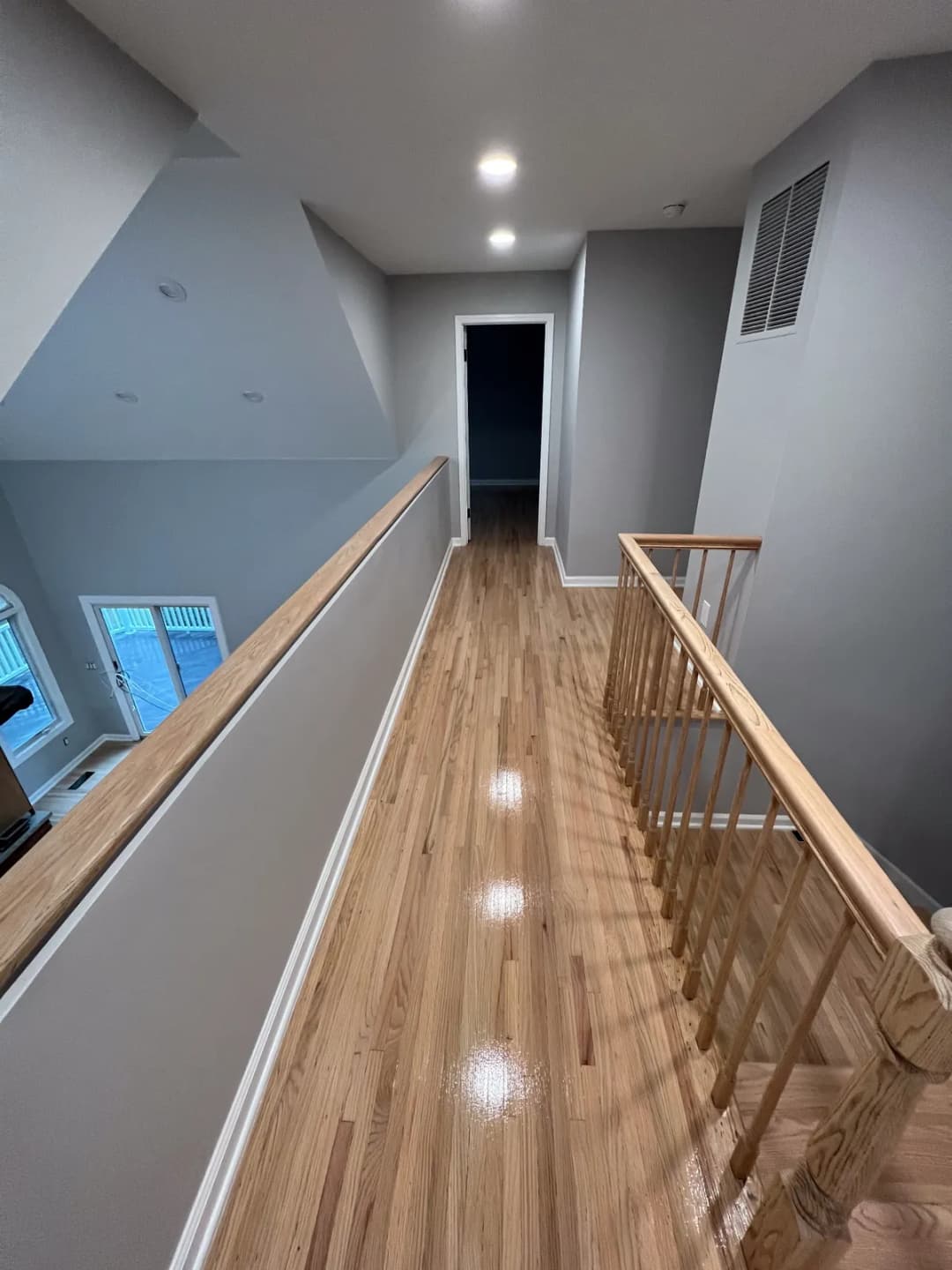 Hardwood floor refinishing project by Summit Home Services