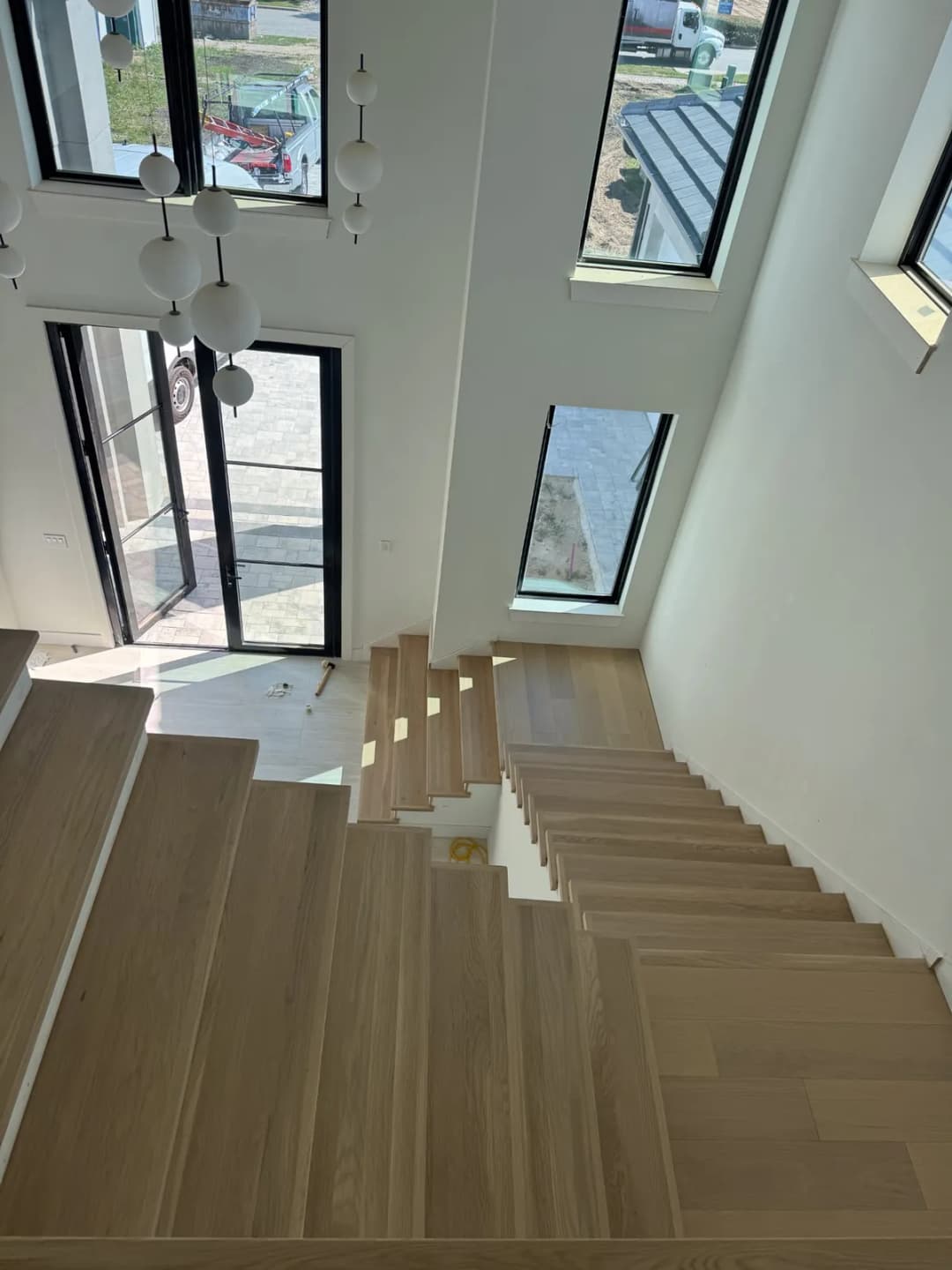 Hardwood floor refinishing project by Summit Home Services