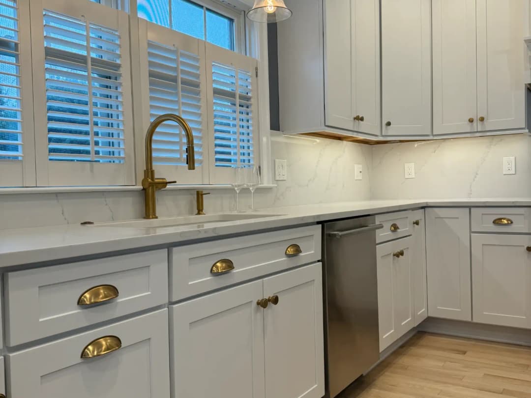 White cabinets with gold hardware — Summit Home Services